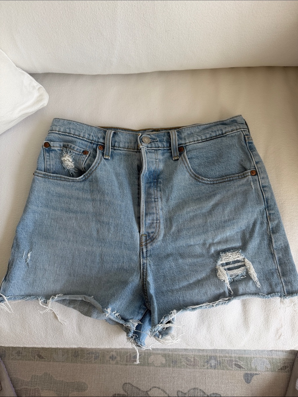Levi’s ribcage shorts - High-Waist Light Blue Distressed Denim Shorts
